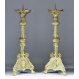 A Pair of Brass Pricket Candlesticks, of triangular form, with gadrooned top rim, central turned