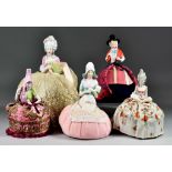 Fifteen Early 20th Century Porcelain Pincushion Half-Dolls with Fabric Skirts, including a Welsh