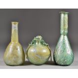 Three Roman Glass Vessels, Circa 1st/4th Century AD - Unguentarium of light green tint, 6.25ins