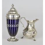 An Edward VII Silver Wirework Sugar Caster and a Victorian Silver Cream Jug, the sugar caster by