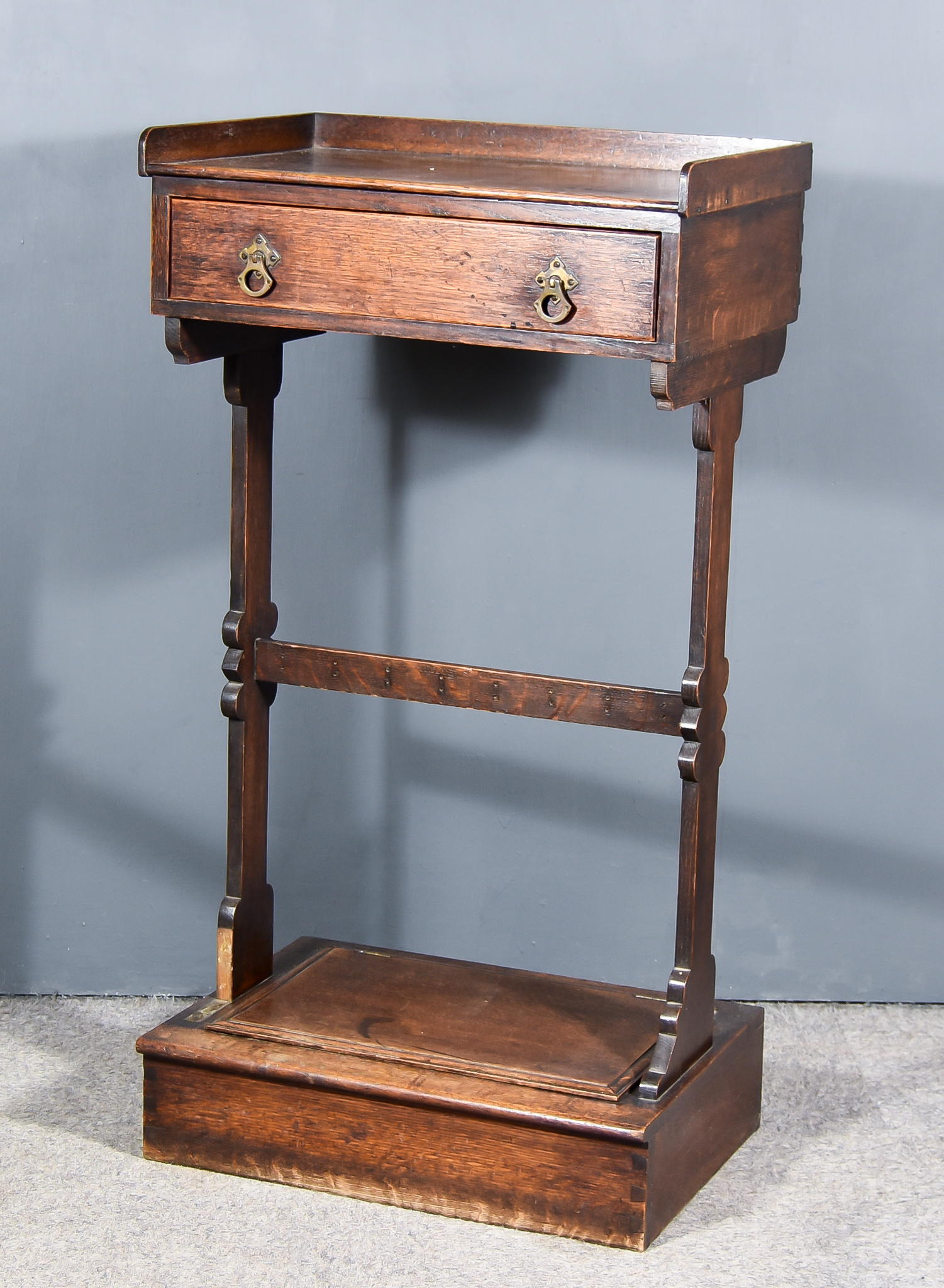 A 19th Century Oak Rectangular Tray Top Lectern, fitted one frieze drawer on shaped end supports,