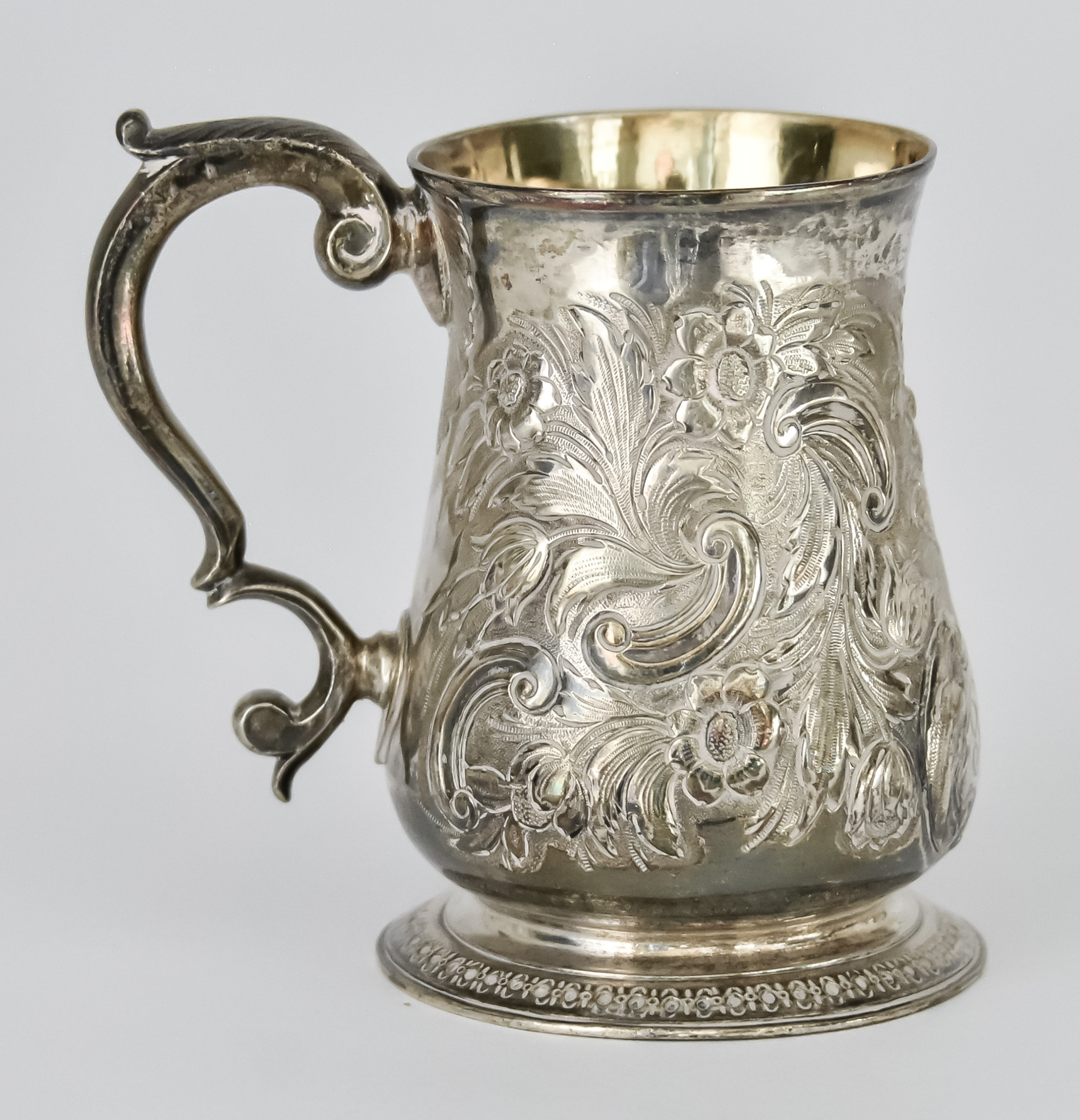 A George II Silver Baluster-Shaped Tankard by Henry Brind, London 1748, later embossed with