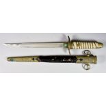 A Japanese Naval Dirk, 1883 Pattern, 9ins bright steel fuller blade, wire wrapped ray skin grip,