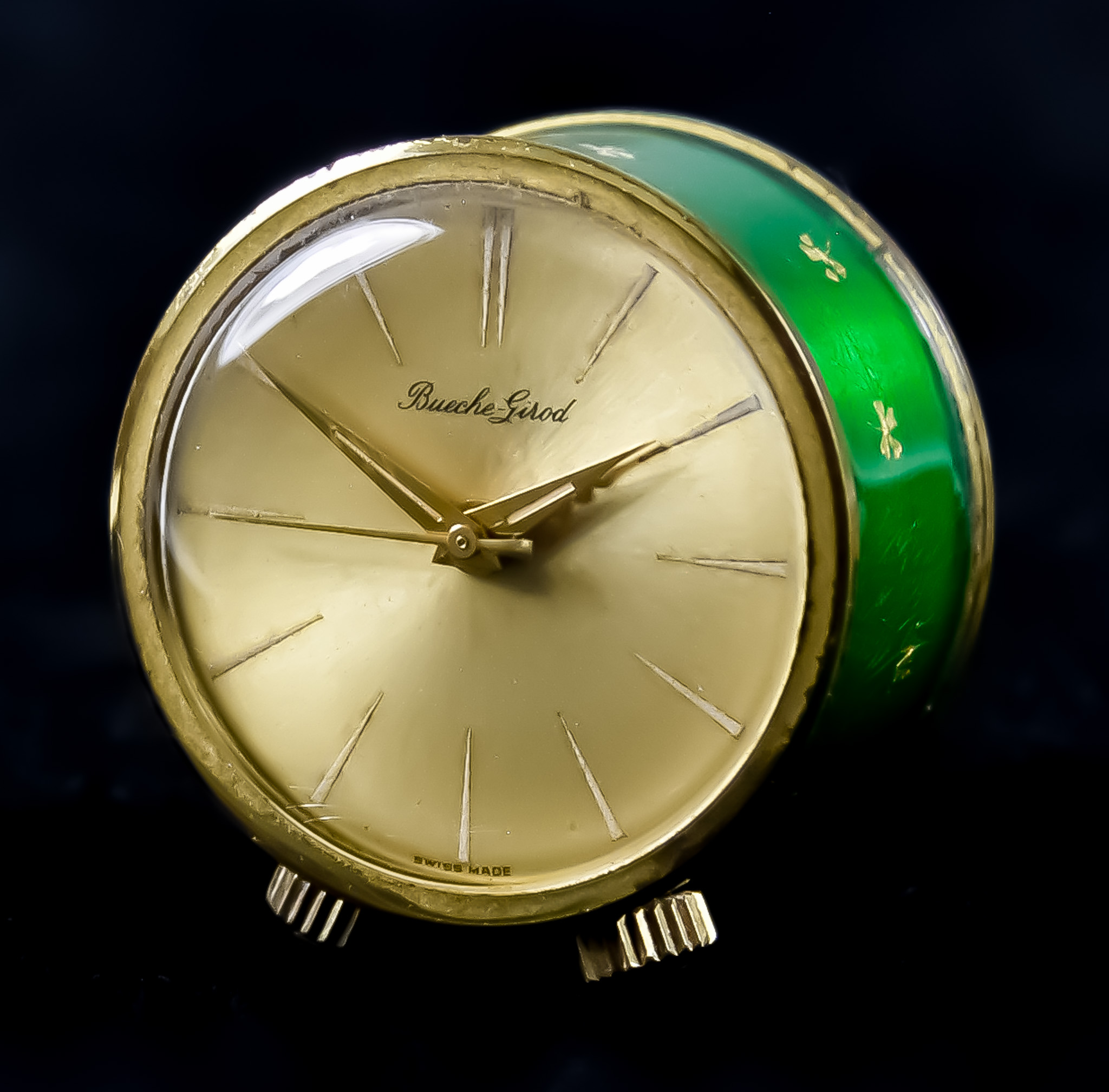 A 20th Century Manual Wind Miniature Travelling Alarm Clock, by Bueche Girod, gilt metal and green