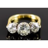 An 18ct Gold Three Stone Diamond Ring, 20th Century, set with three brilliant cut round diamonds,