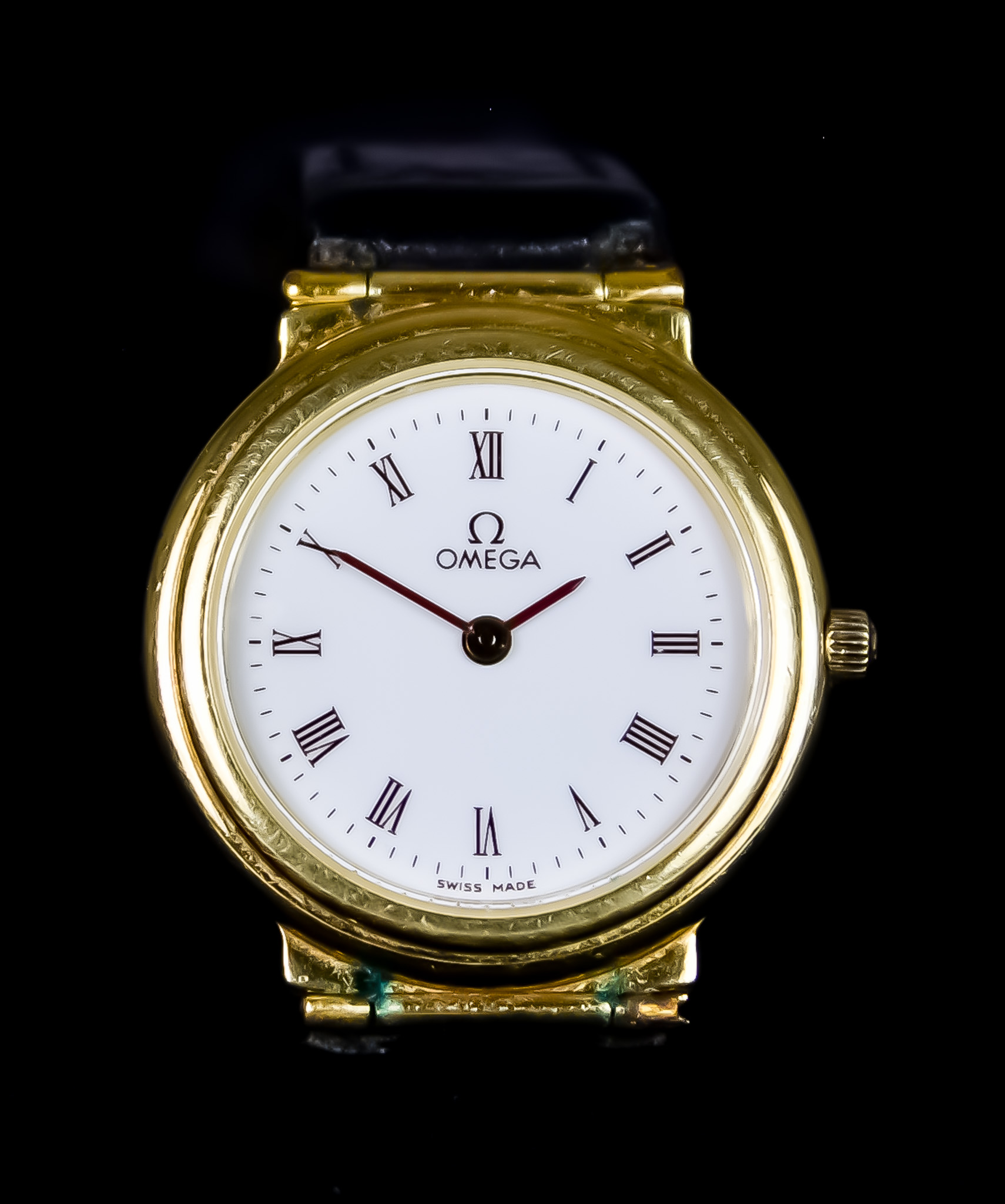 A Lady's Quartz Wristwatch, by Omega, serial No. 1455, 18ct gold case, 24mm diameter, white enamel