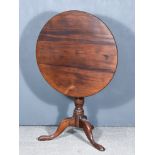 A George III Mahogany Circular Tripod Occasional Table, on cabriole legs with pad feet, 29ins