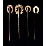 A Mixed Lot of Four Horseshoe Stick Pins, comprising - one 15ct gold, 1.4g, one yellow metal (