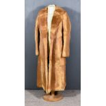 A Lady's Fox Fur Full-Length Coat with embroidered monogram 'SALF' to lining, size 10