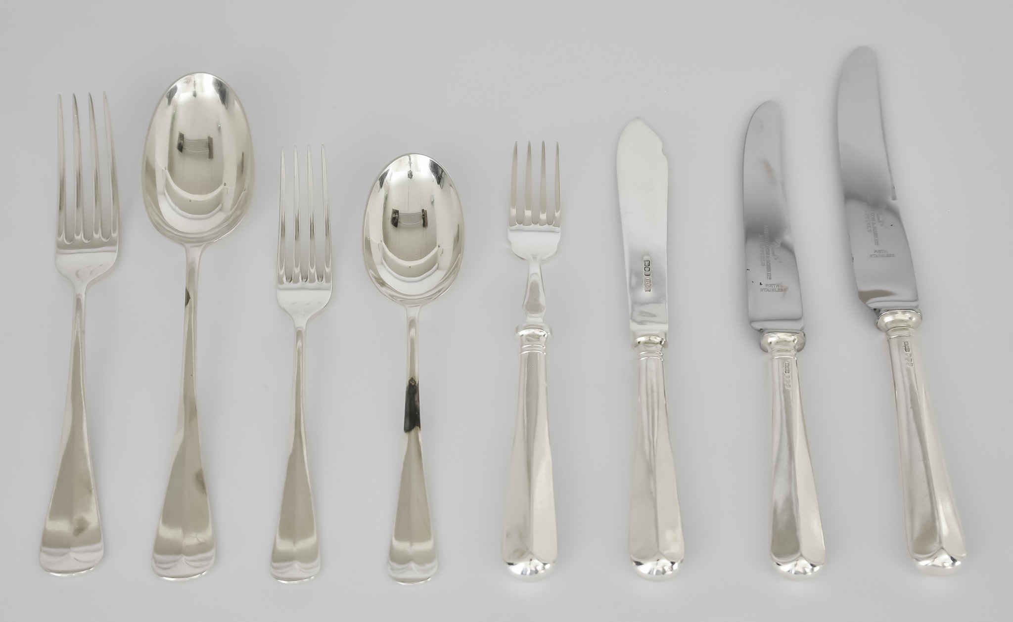 An Elizabeth II Silver Old English and Rat Tail Pattern Table Service for Twelve Place Settings,