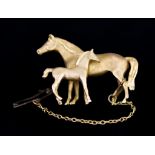 A 9ct Gold Brooch, depicting a mare and foal, 36mm x 25mm, gross weight 9.5g