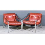 Tim Bates for Pieff - Pair of chrome framed "Beta" armchairs, upholstered in red leather and with