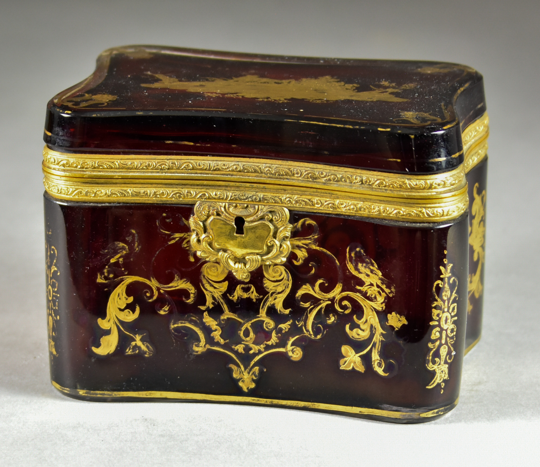 A Ruby Glass and Gilt Metal Mounted Rectangular Casket with Incurved Sides, 19th Century,