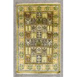 A 20th Century Bakhtiyari Silk Rug of Trellis Design, woven in colours, the field filled with