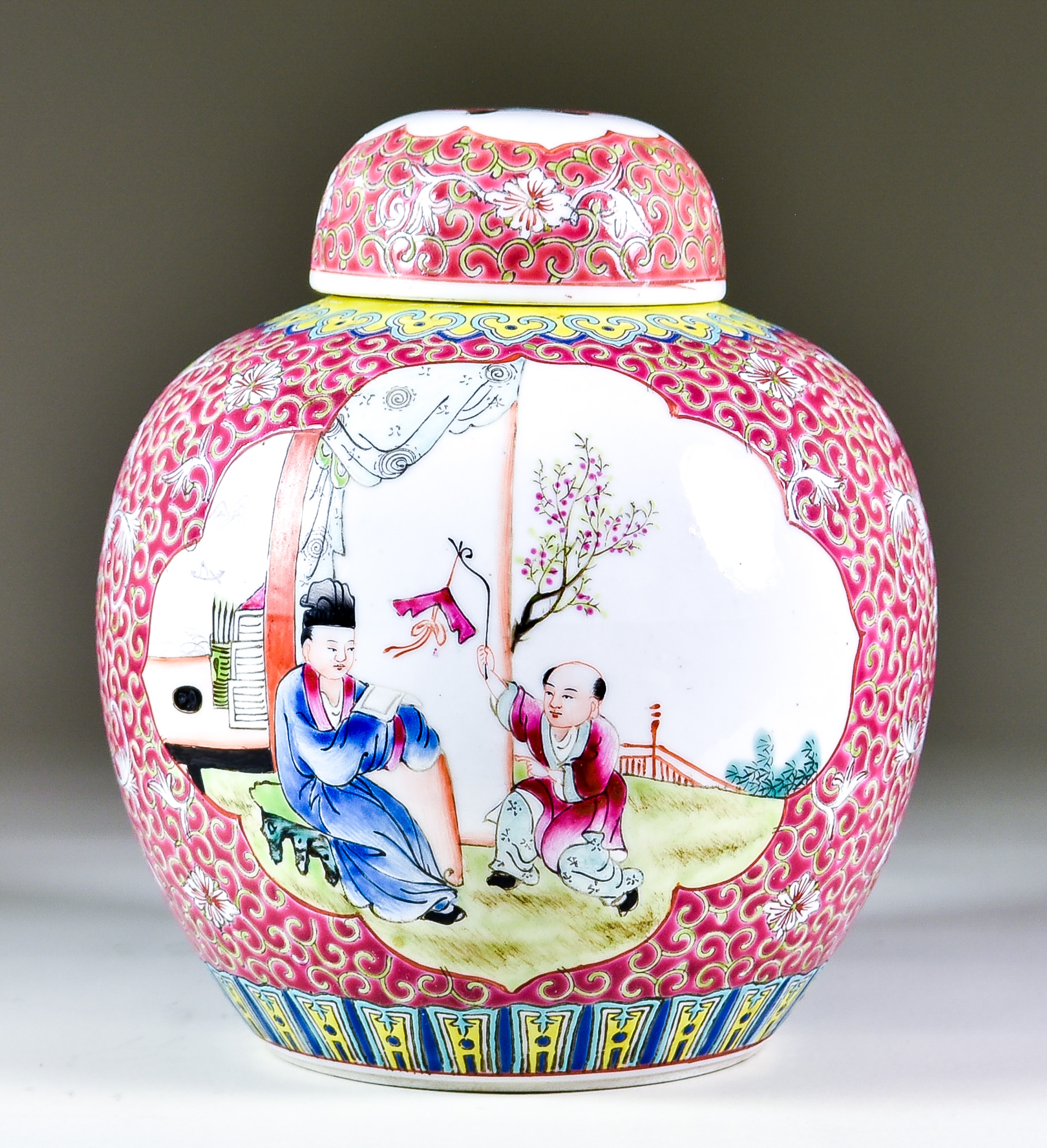 A Chinese Porcelain "Famille Rose" Ginger Jar and Cover, 20th Century, painted in colours of yellow,
