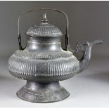 A Chinese Wine Pot and Cover, of archaic form, with high strap handle, 10.25ins (26cm) high