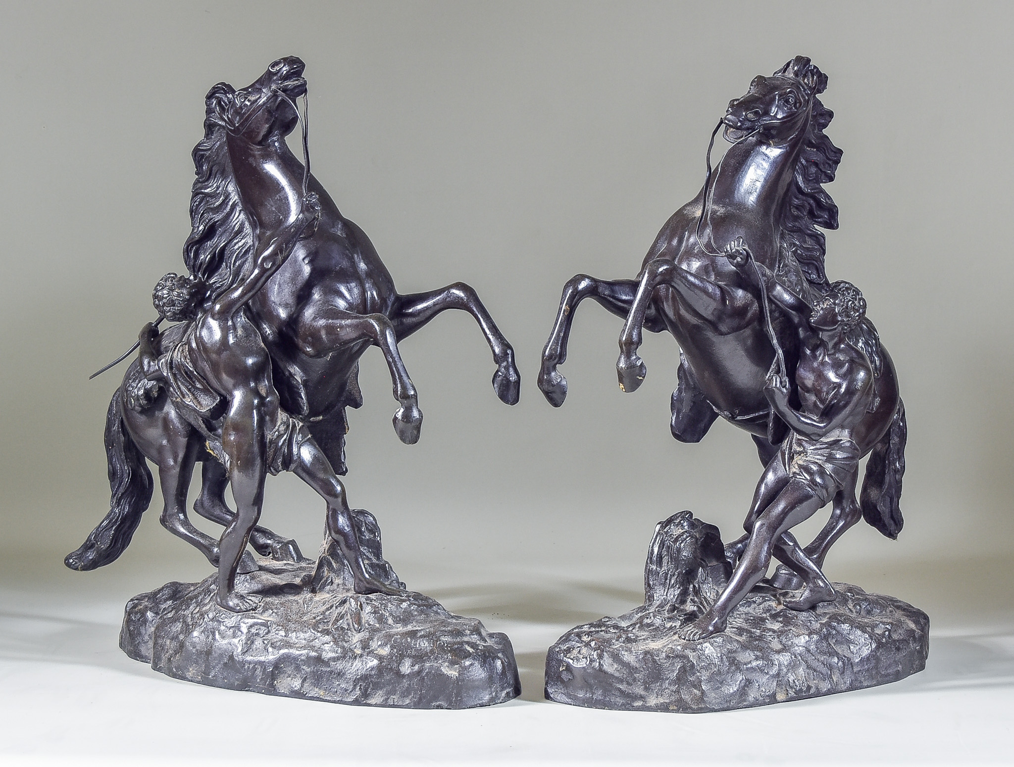 19th Century School - A Pair of Brown Patinated Bronze Figures of Marli Horses, on oval bases, 16ins