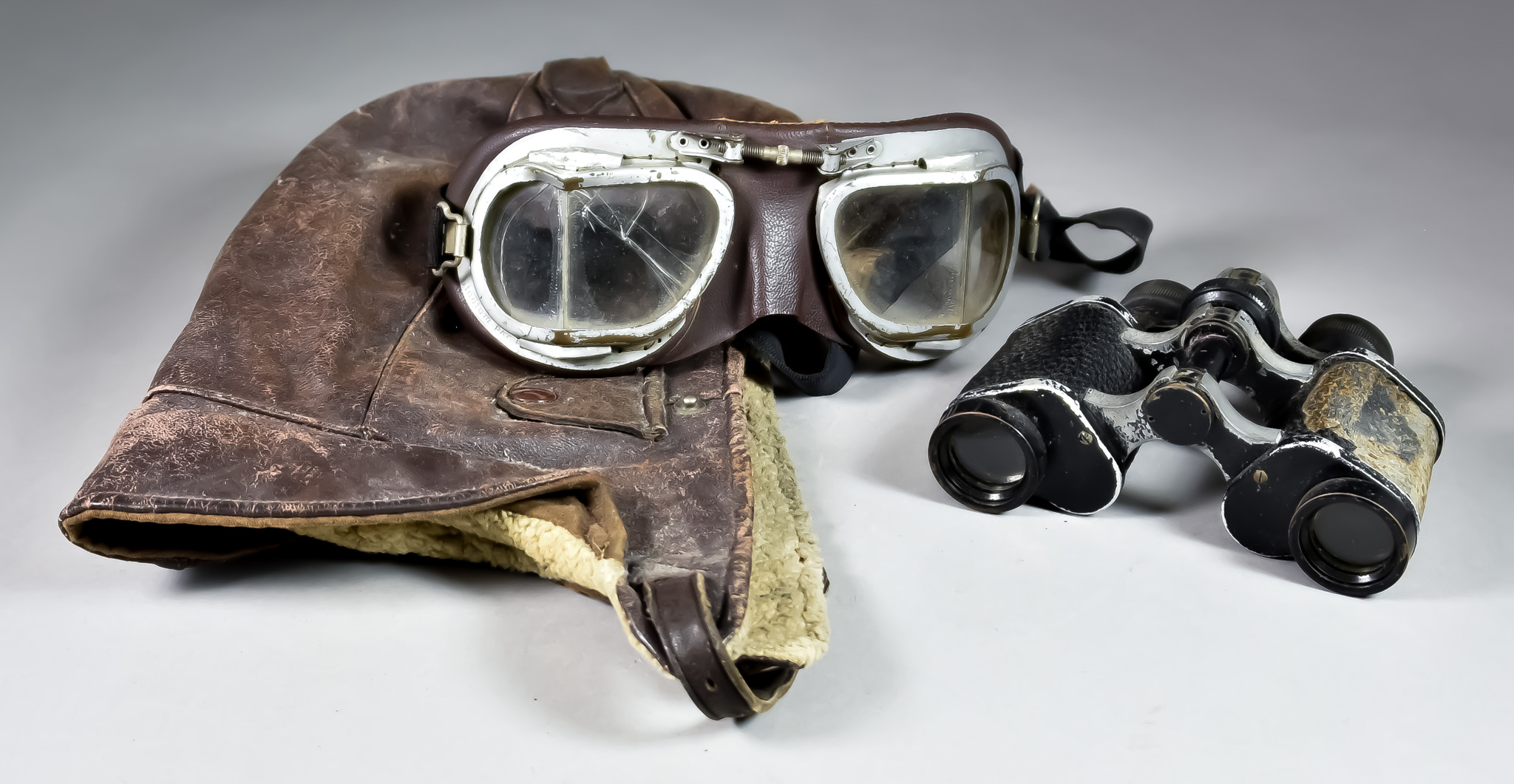 A Quantity of Aviation Leather Goods, 20th Century, comprising - three aviator style leather