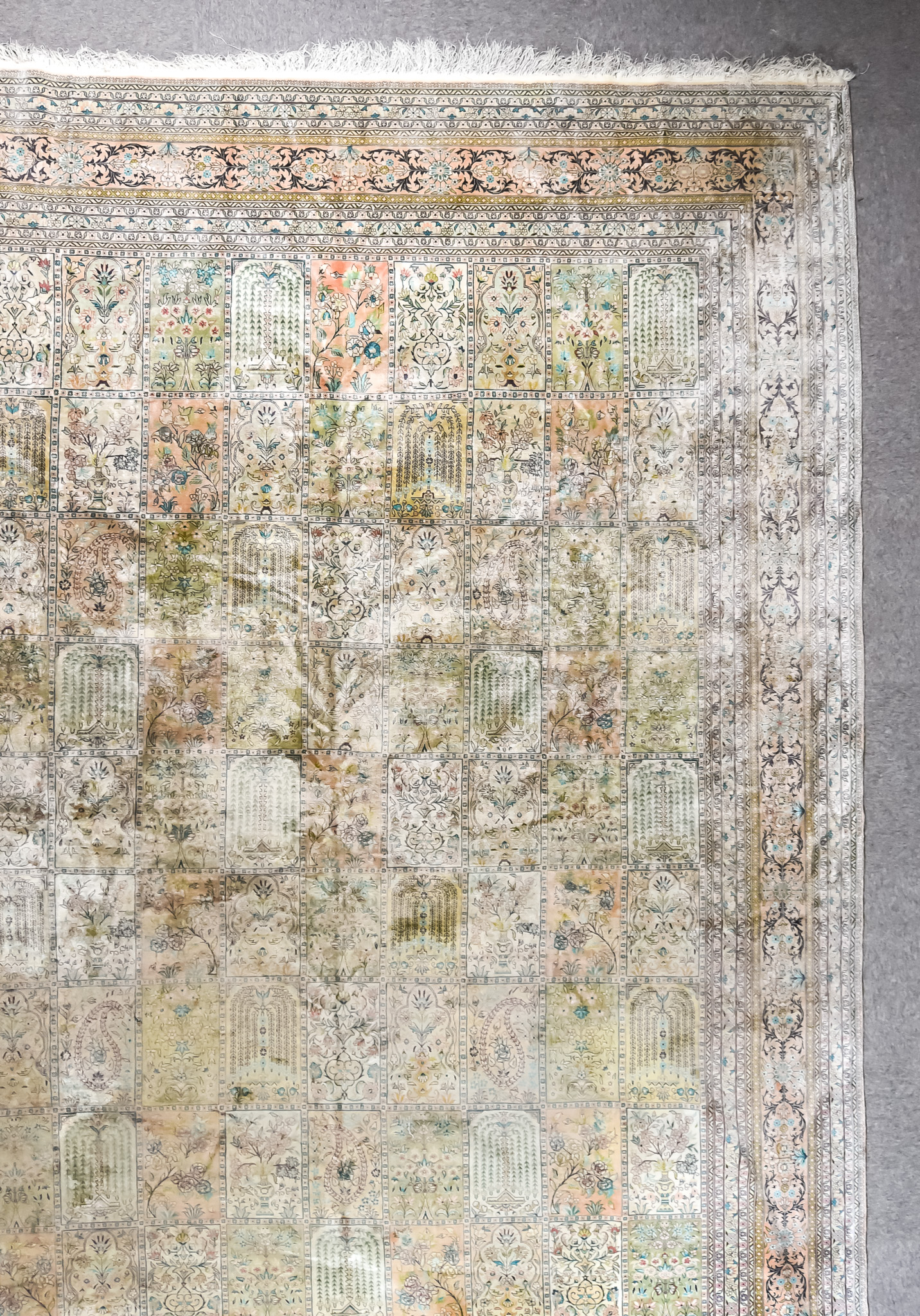 A Pure Silk Bakhtiyari Carpet, of trellis design, woven in pastel shades, the field filled with