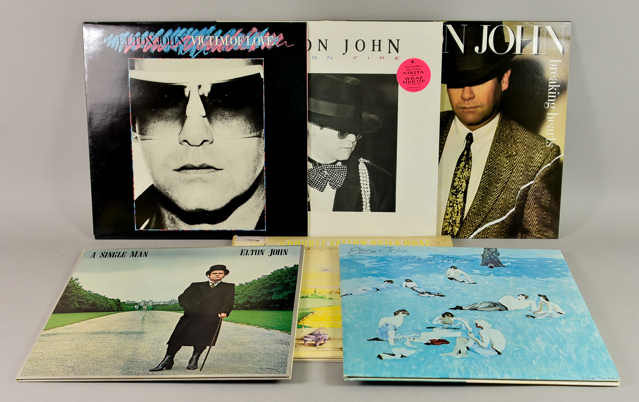 A Quantity of Elton John 12-Inch Vinyl LPs, including - "Blue Moves", "Ice on Fire", "Victim of