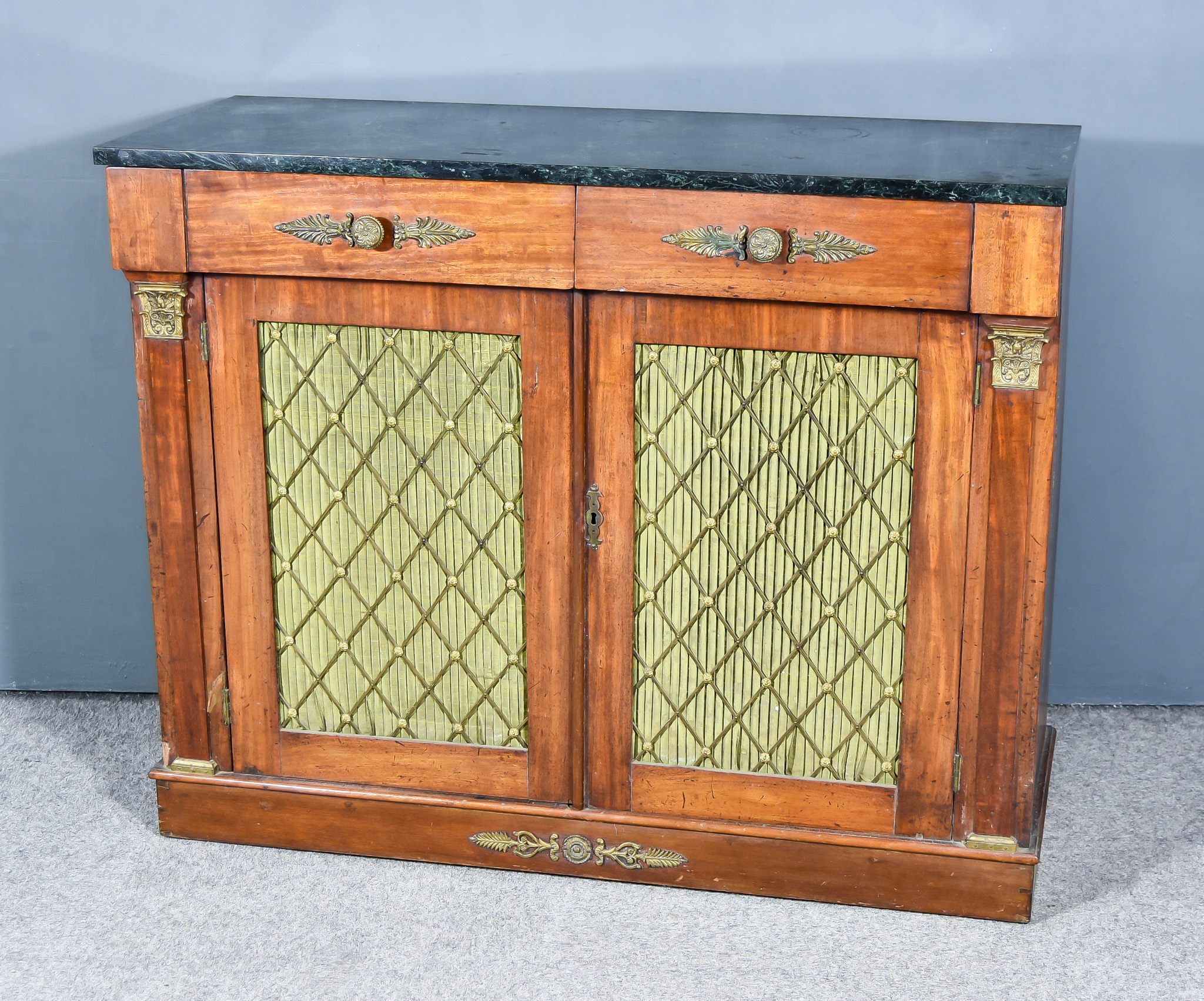 A 19th Century Mahogany and Gilt Metal Mounted Dwarf Cabinet, with green veined marble top, fitted