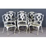 A Set of Six White Painted Aluminium Garden Armchairs, each with shaped crest rail, wreath pattern