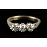 An 18ct White Gold Three Stone Diamond Ring, 20th Century, set with three brilliant cut white