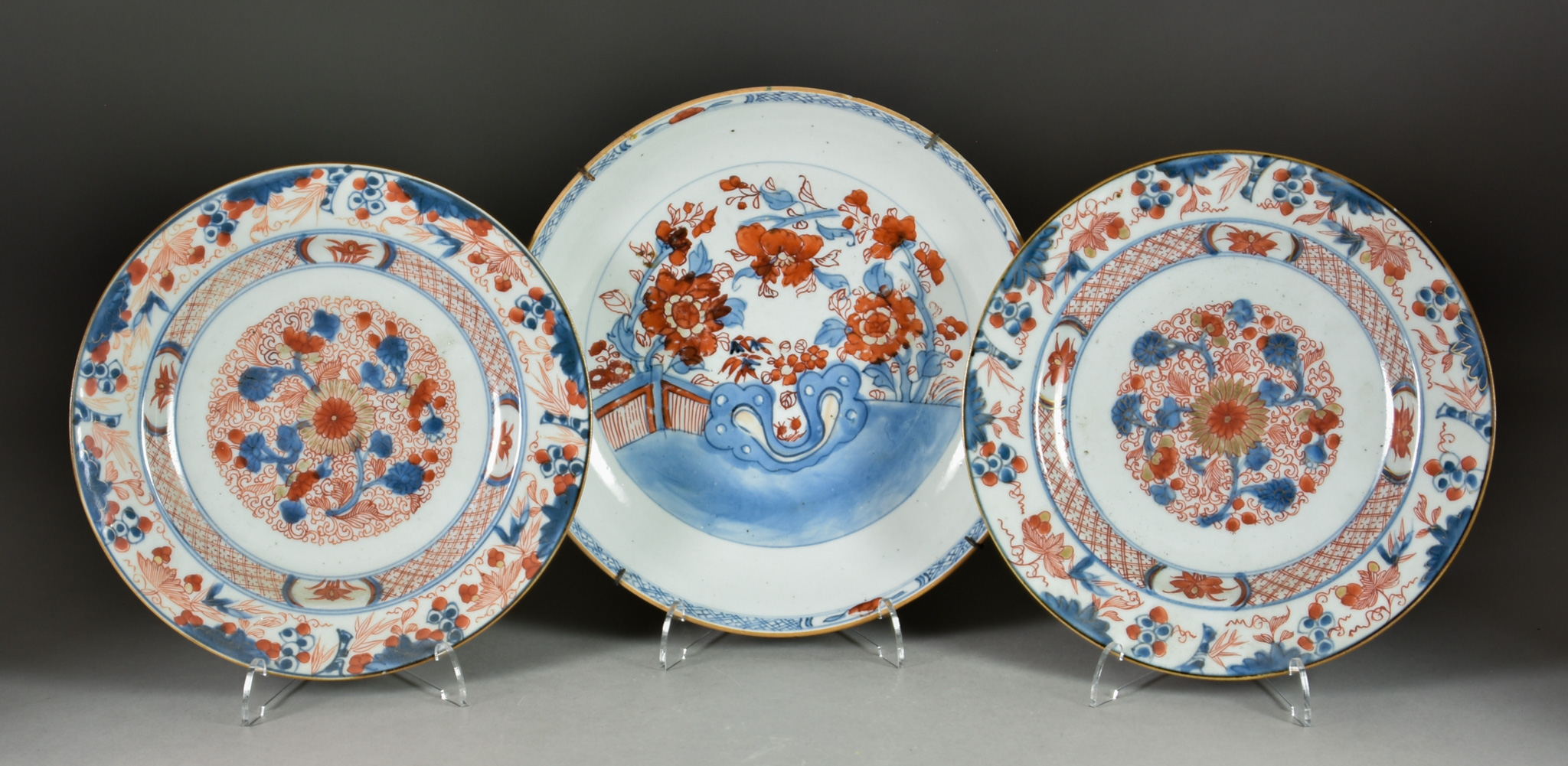 A Pair of Chinese Porcelain Circular Plates, 18th Century, painted in underglaze blue and
