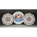 A Pair of Chinese Porcelain Circular Plates, 18th Century, painted in underglaze blue and