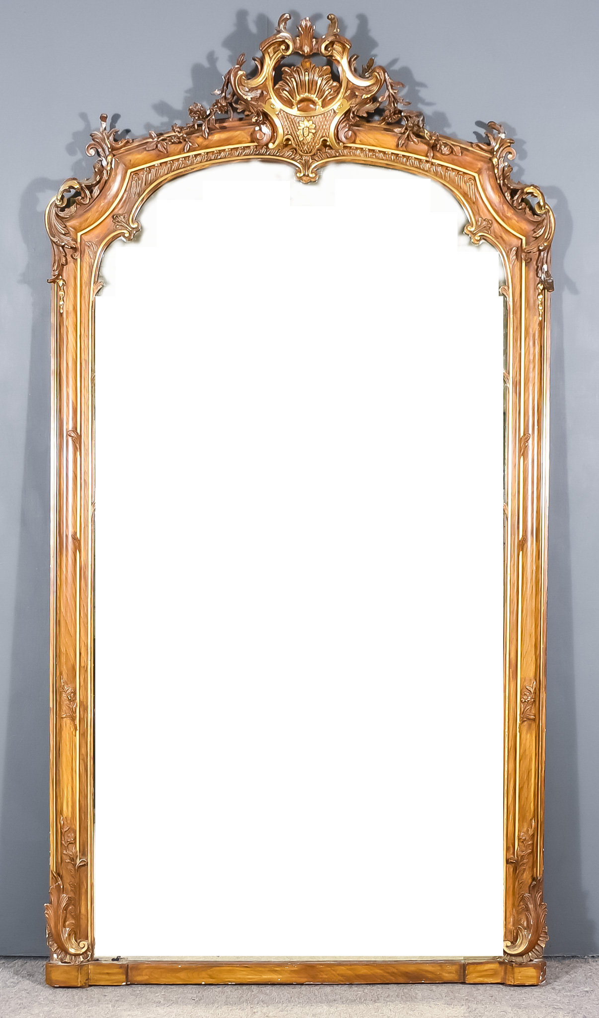 A 19th Century Wood Effect and Gilt Framed Rectangular Overmantle Mirror, with leaf and floral