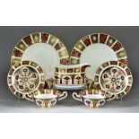 A Royal Crown Derby Bone China "Imari" Pattern Matched Dinner Service, 20th Century, for ten place