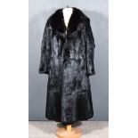 A Lady's Black Mink Full-Length Fur Coat, size 10, with embroidered initials 'SALOF' to lining