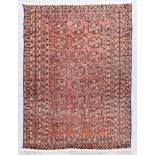 A Late 19th/Early 20th Century Turkmen Rug, woven in colours of fawn, terracotta and navy blue, with