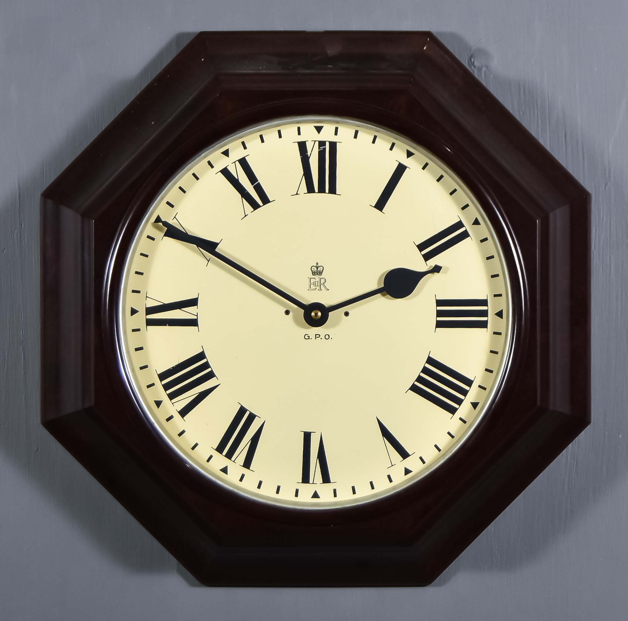 A 20th Century GPO Brown Bakelite Cased Dial Wall Clock and a Mahogany Cased Dial Wall Clock, the