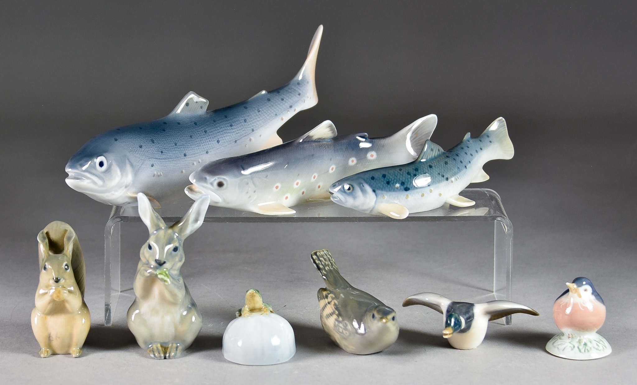 Nine Royal Copenhagen Porcelain Figures - comprising - rainbow trout, No.2676, 8ins x 3.5ins high,