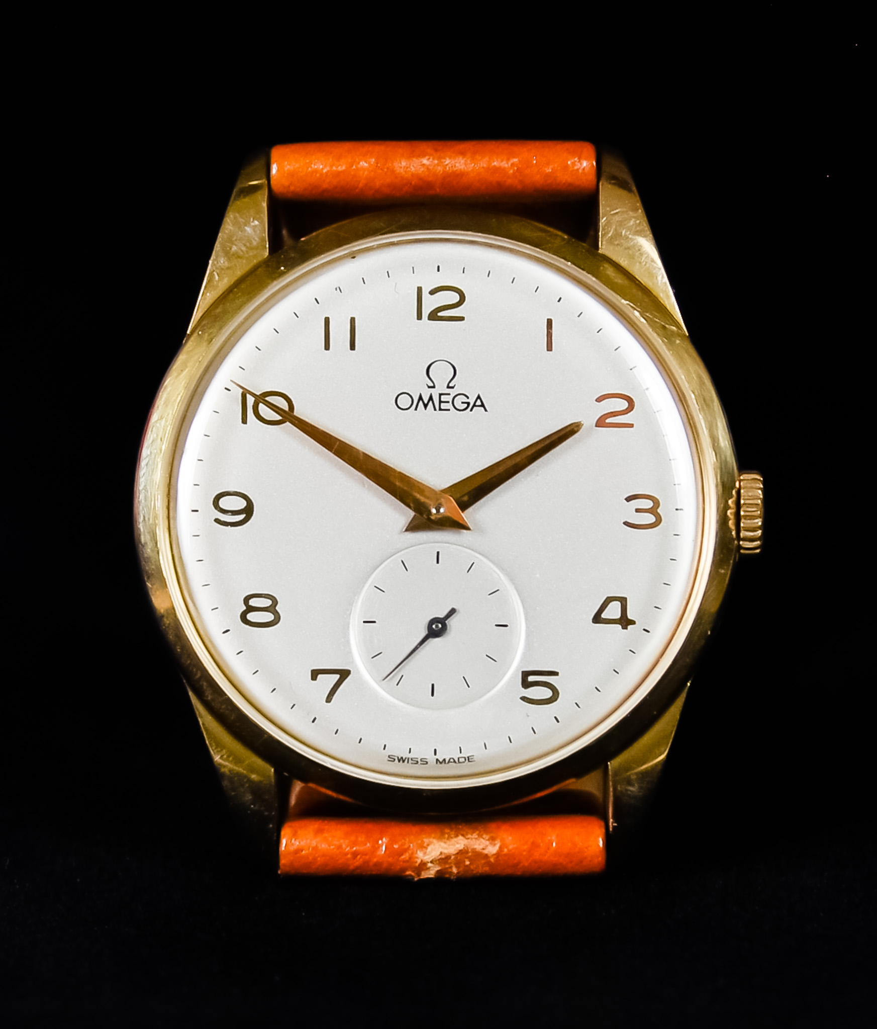 A Gentleman's Manual Wind Wristwatch by Omega, 34mm diameter 18ct gold case, white enamel dial