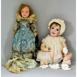 A French Bisque Headed Doll, Circa 1910, "Laughing Jumeau", with impressed number to back of neck
