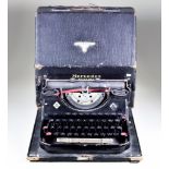 A World War II SS Typewriter, by Mercedes, Model Superba, in portable case, keyboard bears the