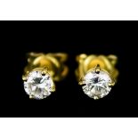 A Pair of 18ct Gold Diamond Solitaire Earrings, Modern, each set with a brilliant cut white diamond,