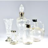 A Victorian Silver Mounted and Clear Glass Claret Jug and Four Other Silver Mounted Glass Items, the