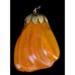 An Amber and Gold Pendant, 20th Century, 14ct gold mount and bale, suspended with a large carved