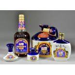 A Quantity of Pusser's Navy Rum, including eleven commemorative decanters and one other bottle Note: