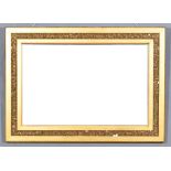 A Gilt Framed Rectangular Wall Mirror, the frame inset with a band of coiled paper and with bevel