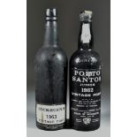 Two Bottles of Vintage Port, comprising - Cockburns 1963 vintage and Porto Santos Junior 1982