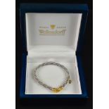 An 18ct White and Yellow Gold Twist Braid Bracelet, by Wellendorff with suspended Wellendorff