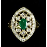 A 10ct Gold Emerald and Diamond Shield Ring, Modern, set with a centre emerald, approximately .75ct,