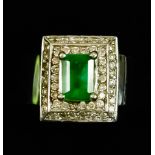 A 14ct White Gold Emerald and Diamond Ring, Modern, set with a centre emerald stone,
