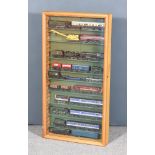 A Purpose Made Glass Fronted Display Cabinet, containing trains, carriages and wagons,