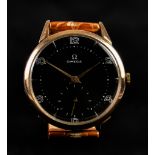 A Gentleman's Manual Wind Wristwatch by Omega, 40mm diameter 18ct gold case, black dial with white
