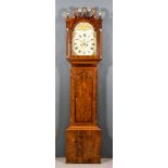 A 19th Century Mahogany Long Case Clock, the 13ins arched painted dial with Roman numerals,